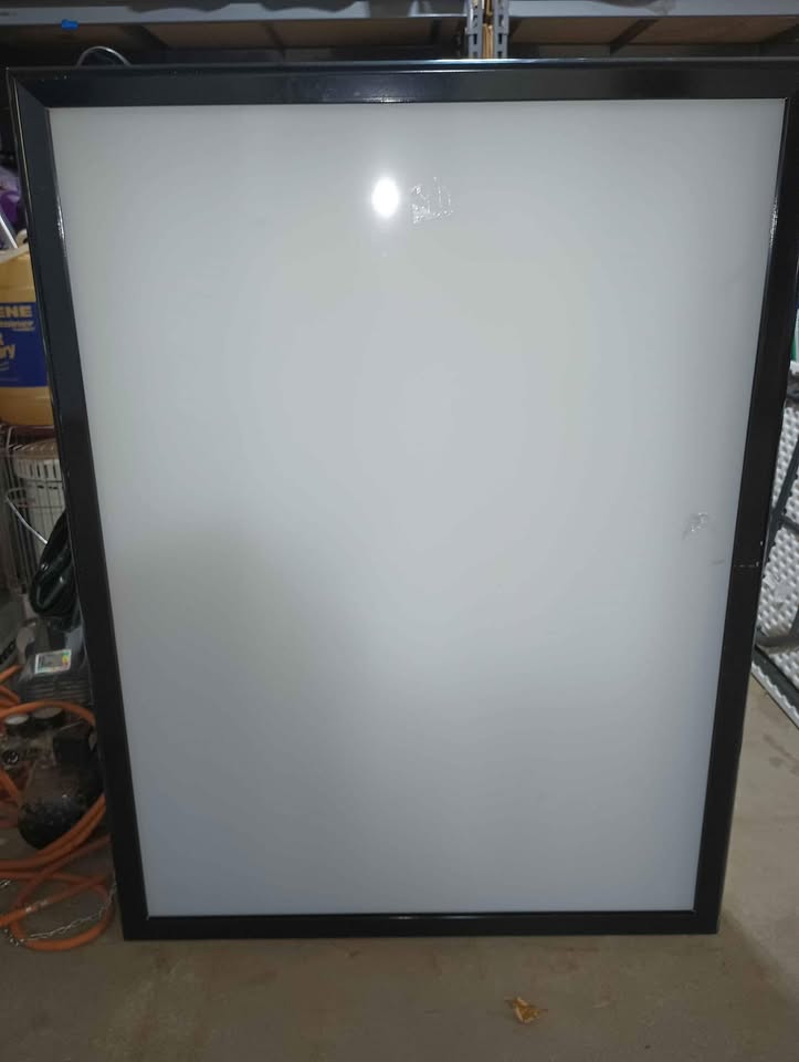 Commercial lighted double sided hanging movie poster display. 50" x 38"